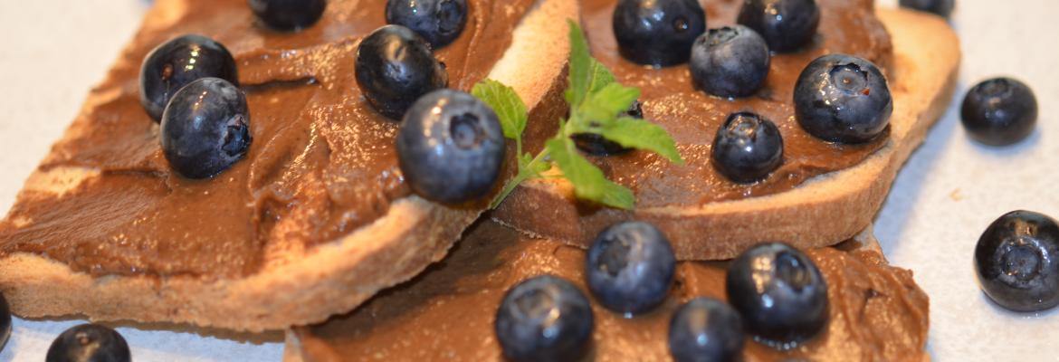 Toast with chocolate cream and blueberries